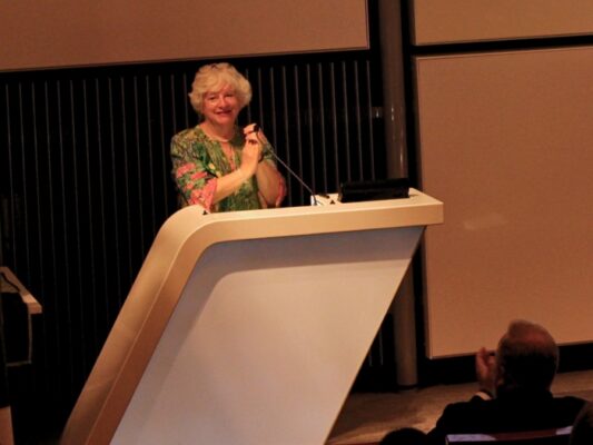 Dame Alison Peacock delivering remarks at the lecture